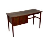 DENMARK; A RECTANGULAR AMERICAN WALNUT DESK