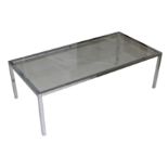 UNKNOWN: a chrome and glass coffee table