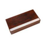 ALFRED KLITGAARD (DENMARK 1926-2005); A Danish rosewood and silver inlaid cigarette box