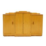 EPSTEIN: AN ART DECO BIRD'S EYE MAPLE BREAK FRONT SIDEBOARD