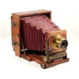 Brass Bound Lancaster Half Plate Field Camera with Maroon Bellows