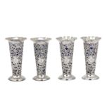 A set of four Victorian sterling silver posy vases, London 1893 by William Comyns