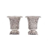 A pair of late 19th / early 20th century Ottoman Turkish 900 standard silver spoon warmers, with