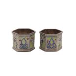 A pair of early 20th century Iranian (Persian) silver and champlevé enamel napkin rings, probably