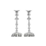 A matched pair of Victorian / Edwardian candlesticks, Birmingham 1897/1902 by Elkington & Co