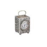 An Edwardian sterling silver cased travelling timepiece carriage clock, London 1905 by William