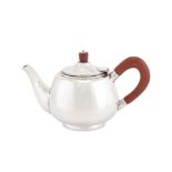 An Elizabeth II sterling silver ‘hand crafted’ teapot, Birmingham 1958 by MMC