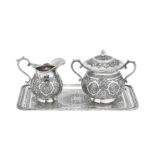 A mid – 20th century Iranian (Persian) silver sugar and cream set on tray, Isfahan circa 1972 mark