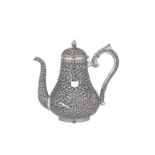 A late 19th century Anglo – Indian silver coffee pot, Cutch, Bhuj, circa 1870 by Oomersi Mawji
