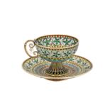 An early 20th century Norwegian 930 standard silver gilt and plique-à-jour enamel cup and saucer,