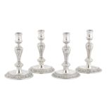 Welsh Interest - A set of four George I Britannia standard silver candlesticks, London 1725 by
