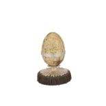 An Elizabeth II sterling silver parcel gilt novelty surprise musical easter egg, London 1982 by