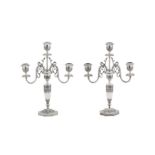 A pair of early 20th century Iranian (Persian) unmarked silver three light candelabra, Isfahan