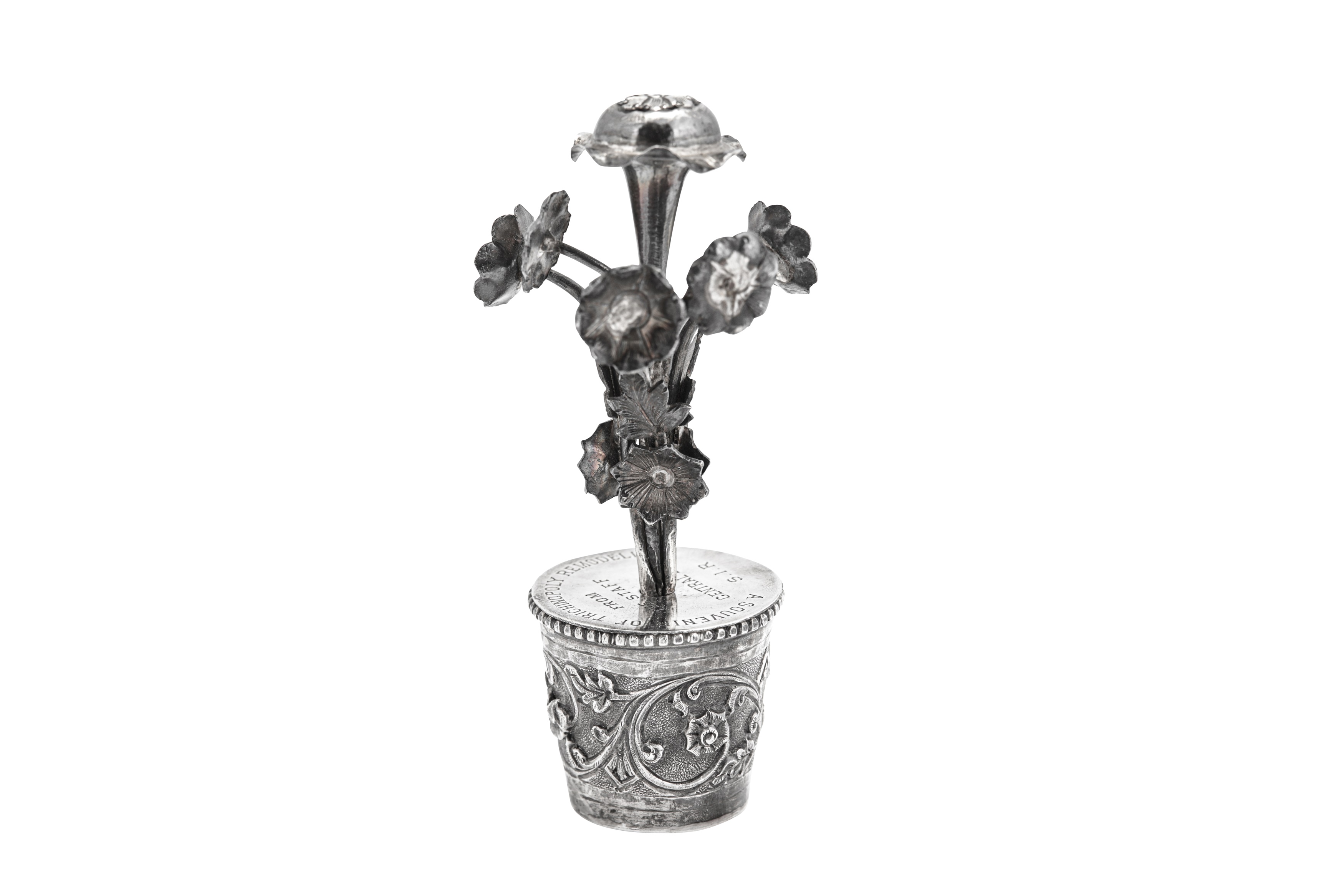 An early 20th century Indian unmarked silver model of flowers in a pot, circa 1930