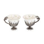 A pair of mid-20th century Iranian (Persian) unmarked silver filigree Turkish coffee cup holders,