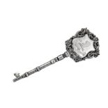 An early 20th century Indian Colonial unmarked silver presentation key, circa 1904