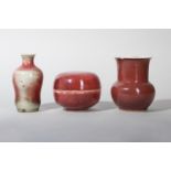 THREE CHINESE COPPER RED-GLAZED SCHOLAR'S DESK ITEMS.