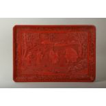 A CINNABAR LACQUERED ‘ELEPHANT’ TRAY.