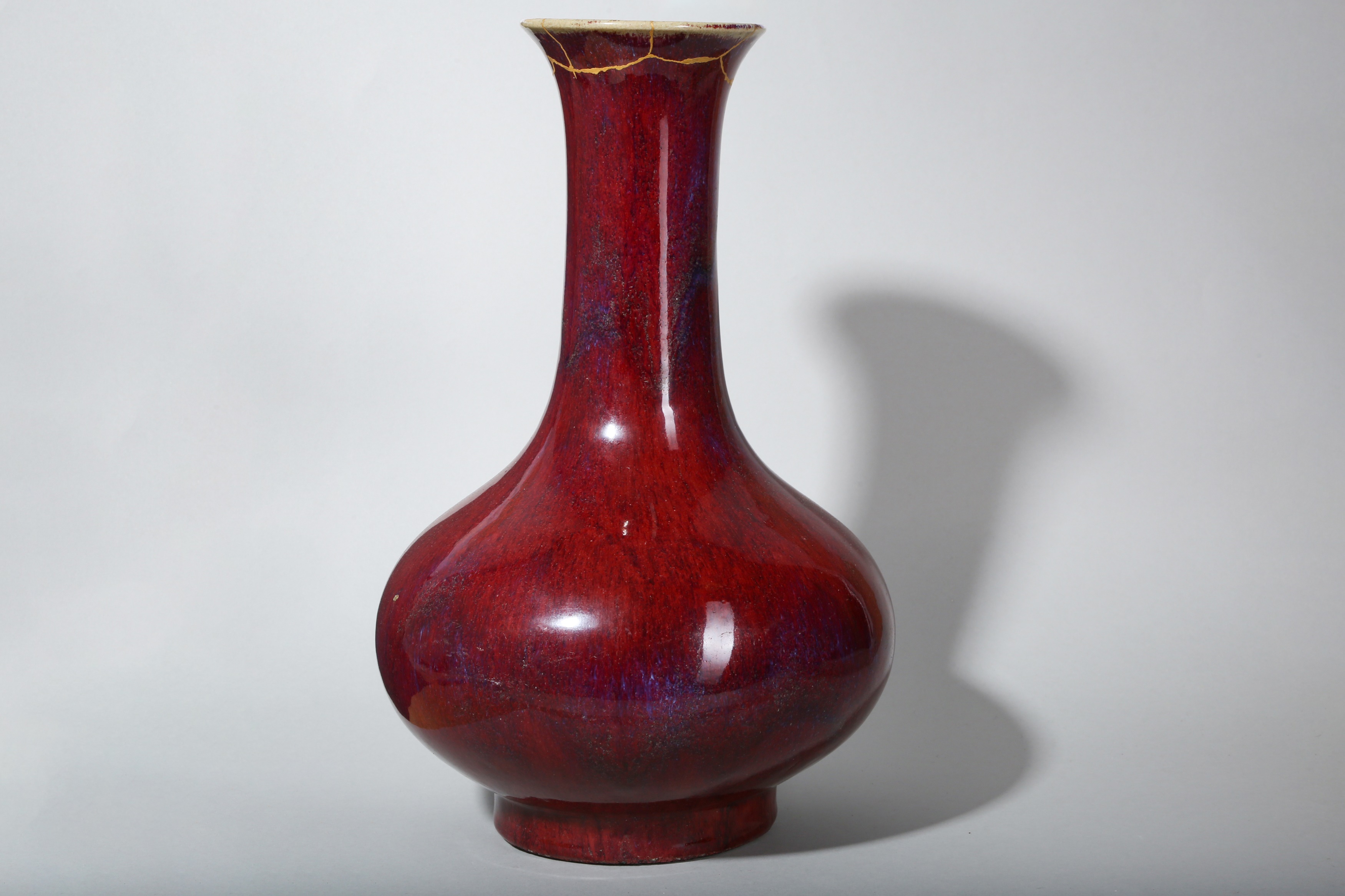 A LARGE CHINESE FLAMBÉ-GLAZED BOTTLE VASE.