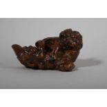 A CHINESE ROOT WOOD 'LION AND CUB' CARVING.