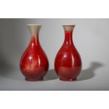 A PAIR OF CHINESE COPPER RED-GLAZED VASES.