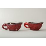 A PAIR OF CHINESE CINNABAR LACQUER POURING VESSELS, YI,