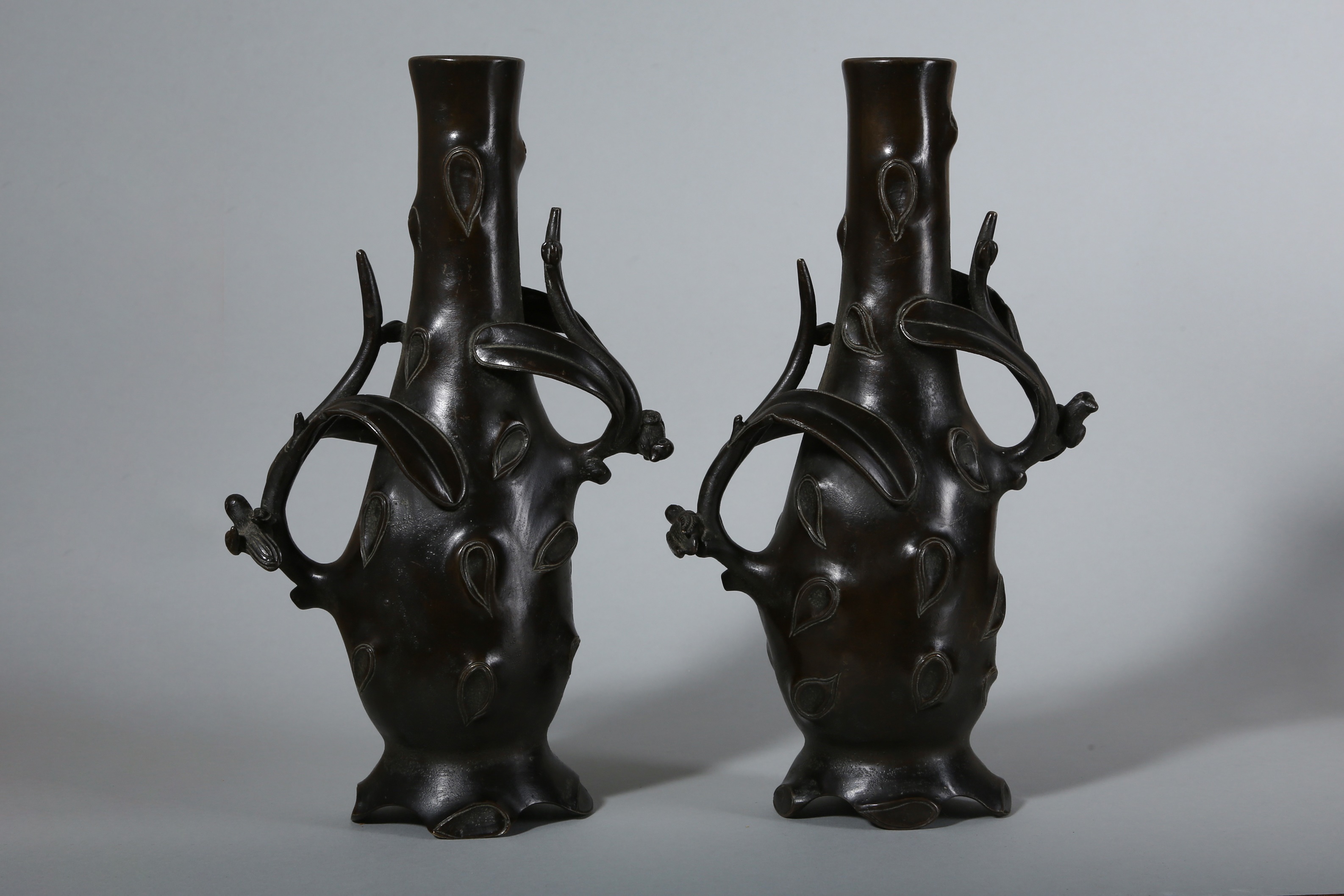 A PAIR OF CHINESE BRONZE 'PRUNUS TREE' VASES.