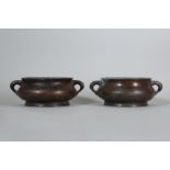 A PAIR OF CHINESE BRONZE INCENSE BURNERS.