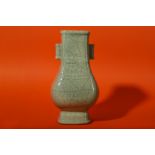 A CHINESE CRACKLE-GLAZE CELADON VASE, HU.