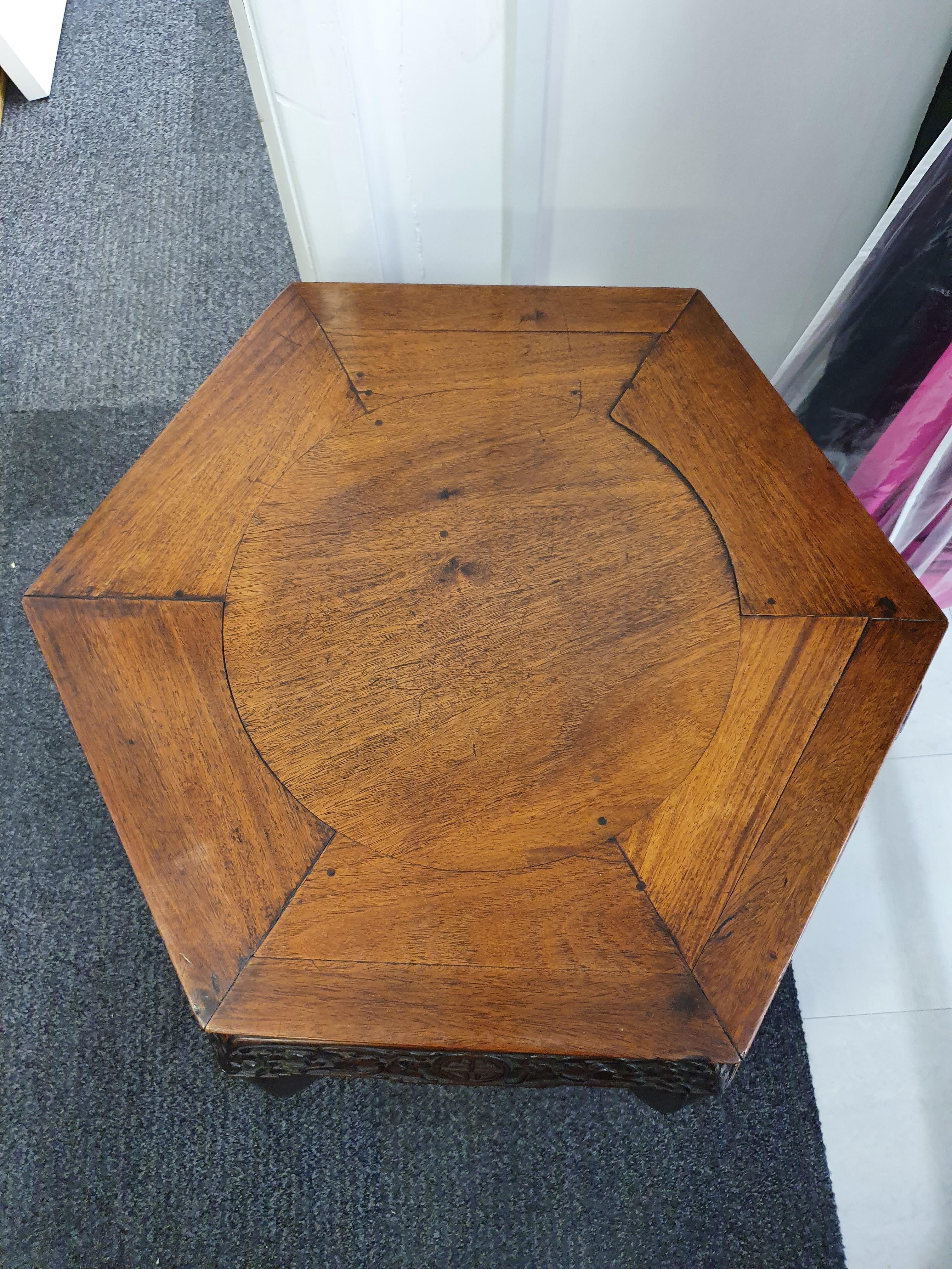 A CHINESE HEXAGONAL CARVED WOOD STAND. - Image 9 of 11