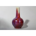 A CHINESE FLAMBÉ-GLAZED BOTTLE VASE.