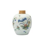 A CHINESE WUCAI 'BLOSSOMS' JAR.