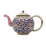 A CHINESE FAMILLE ROSE CANTON ENAMEL 'DRAGON' TEAPOT AND COVER.