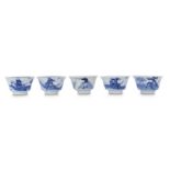 FIVE CHINESE BLUE AND WHITE 'HUNTERS' CUPS.