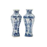 A PAIR OF MINIATURE CHINESE BLUE AND WHITE VASES.