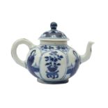 A SMALL CHINESE BLUE AND WHITE TEAPOT AND COVER.