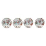 A SET OF FOUR CHINESE FAMILLE ROSE SAUCERS.