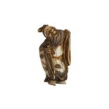 λ AN IVORY NETSUKE OF A SENNIN.