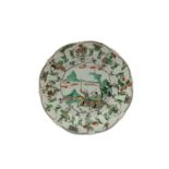 A CHINESE FAMILLE VERTE 'EQUESTRIAN' DISH.