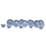 SIX CHINESE BLUE AND WHITE 'LOTUS PETALS' CUPS AND SEVEN SAUCERS.