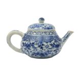 A CHINESE BLUE AND WHITE TEAPOT AND COVER.