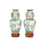 A PAIR OF CHINESE FAMILLE ROSE WALL VASES.