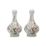A PAIR OF CHINESE FAMILLE ROSE GARLIC MOUTH 'PEACHES' VASES.
