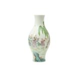 A CHINESE FAMILLE ROSE FIGURATIVE VASE.