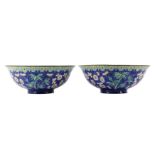 A PAIR OF CHINESE CANTON ENAMEL 'PRUNUS' BOWLS.