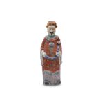 A CHINESE FAMILLE ROSE FIGURE OF AN OFFICIAL.
