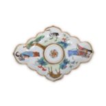 A CHINESE FAMILLE ROSE QUATREFOIL CUP STAND.