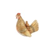 A JAPANESE EARTHENWARE MODEL OF FOWLS.