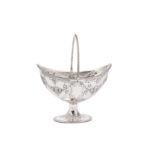 A Victorian sterling silver sugar basket, Sheffield 1872 by Martin, Hall and Co