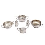 A mixed group of sterling silver twin handled sugar bowls